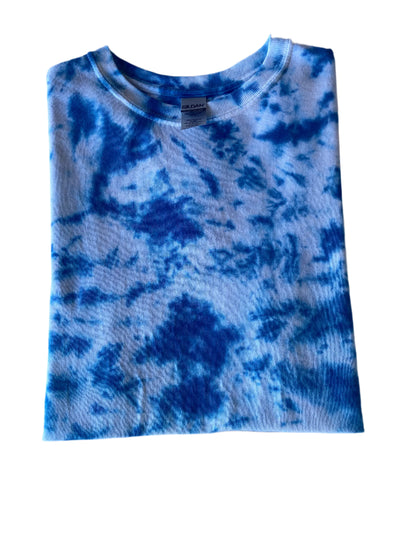 Size small, folded blue and white tie-dye pattern short sleeve t-shirt.